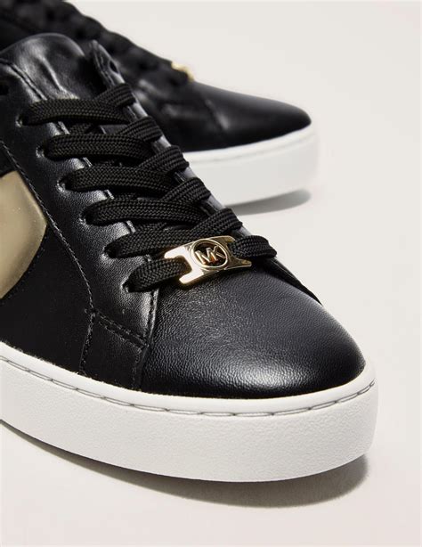 michael kors black and gold sneakers|michael kors heeled sneakers.